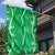 Hawaii Maile Lei Garden Flag With Green Monstera Pattern