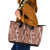 Hawaii Maile Lei Leather Tote Bag With Brown Monstera Pattern