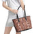 Hawaii Maile Lei Leather Tote Bag With Brown Monstera Pattern