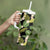 Black Hawaii Plumeria Lei With Tropical Leaves Tumbler With Handle