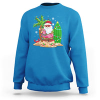 Christmas In Hawaii Sweatshirt Flamingo Float Xmas Palm Tree Surfboard Cute Santa At Beach TS09 Sapphire - Polynesian Pride